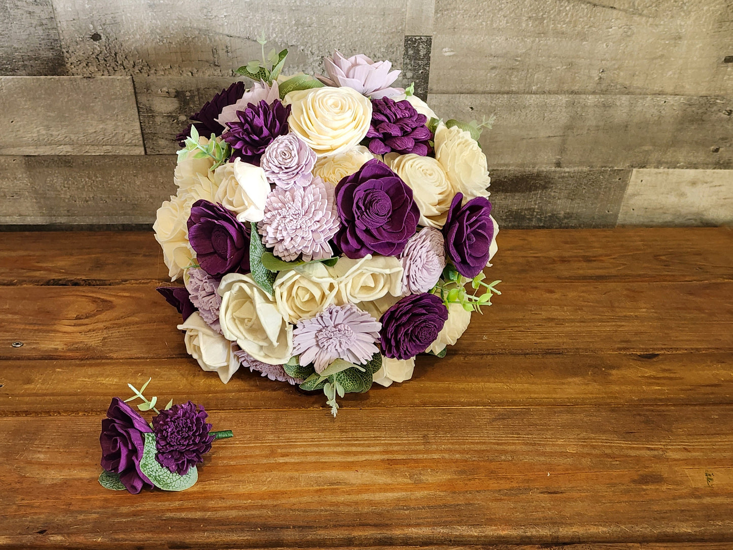 Wedding Bouquet with a matching Boutonniere in Ivory and Shades of Purple