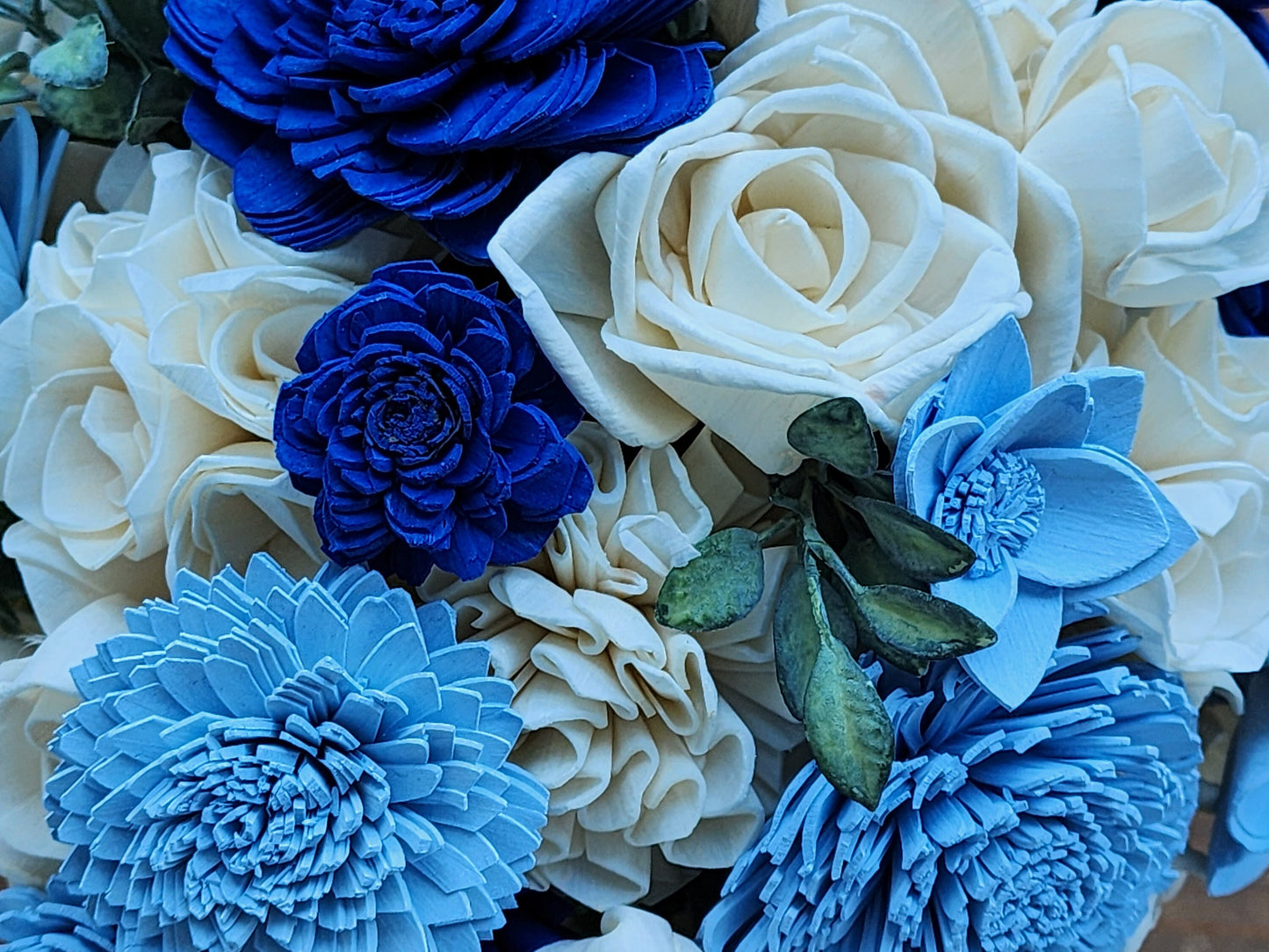 Wedding Bouquet with a matching Boutonniere in Ivory and Shades of Blue