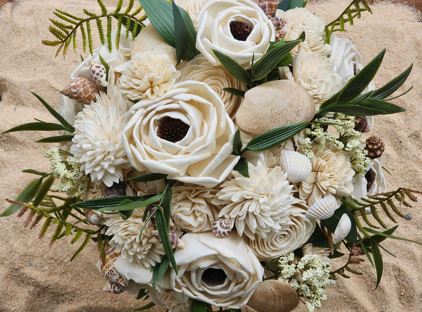 Beach Theme Wedding Bouquet with a matching Boutonniere