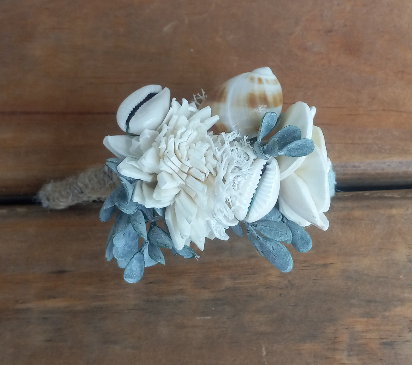 Beach Theme Wedding Bouquet with a matching Boutonniere in Shades of Pinks and Peaches