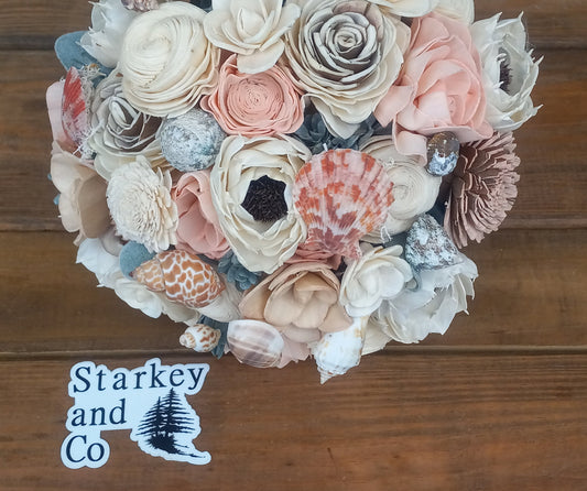 Beach Theme Wedding Bouquet with a matching Boutonniere in Shades of Pinks and Peaches