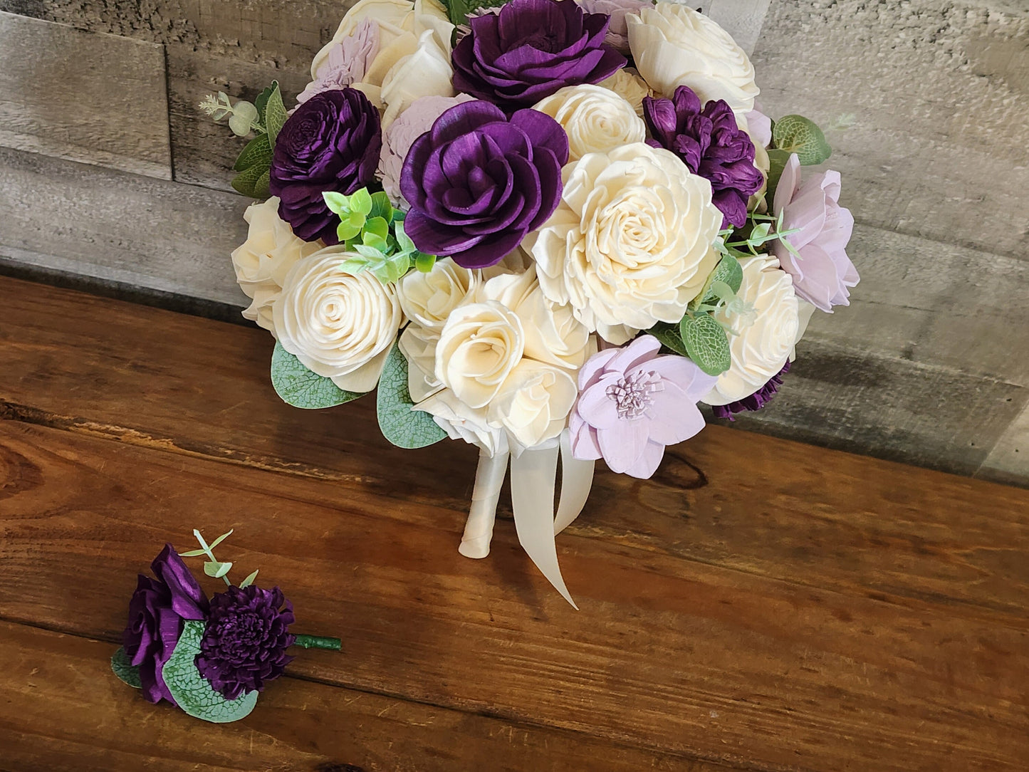 Wedding Bouquet with a matching Boutonniere in Ivory and Shades of Purple