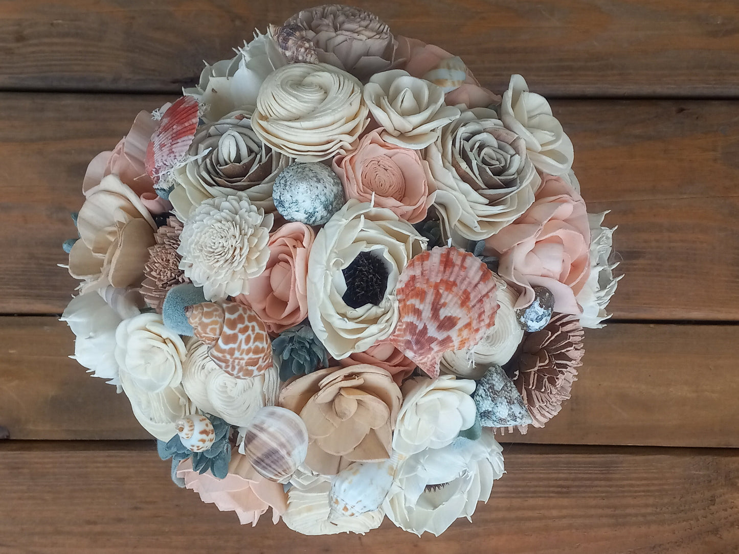 Beach Theme Wedding Bouquet with a matching Boutonniere in Shades of Pinks and Peaches