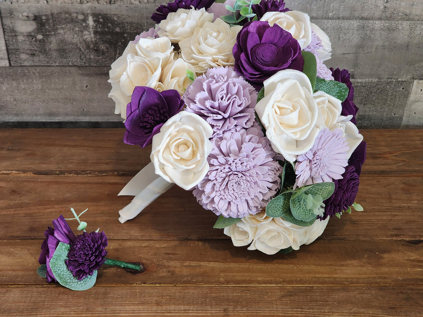 Wedding Bouquet with a matching Boutonniere in Ivory and Shades of Purple
