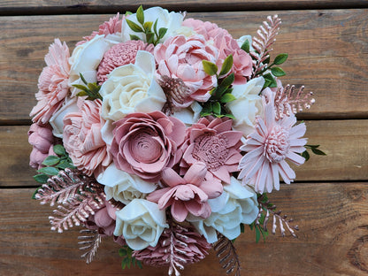 Wedding Bouquet with a matching Boutonniere in Ivory, Shades of Pink and Rose Gold