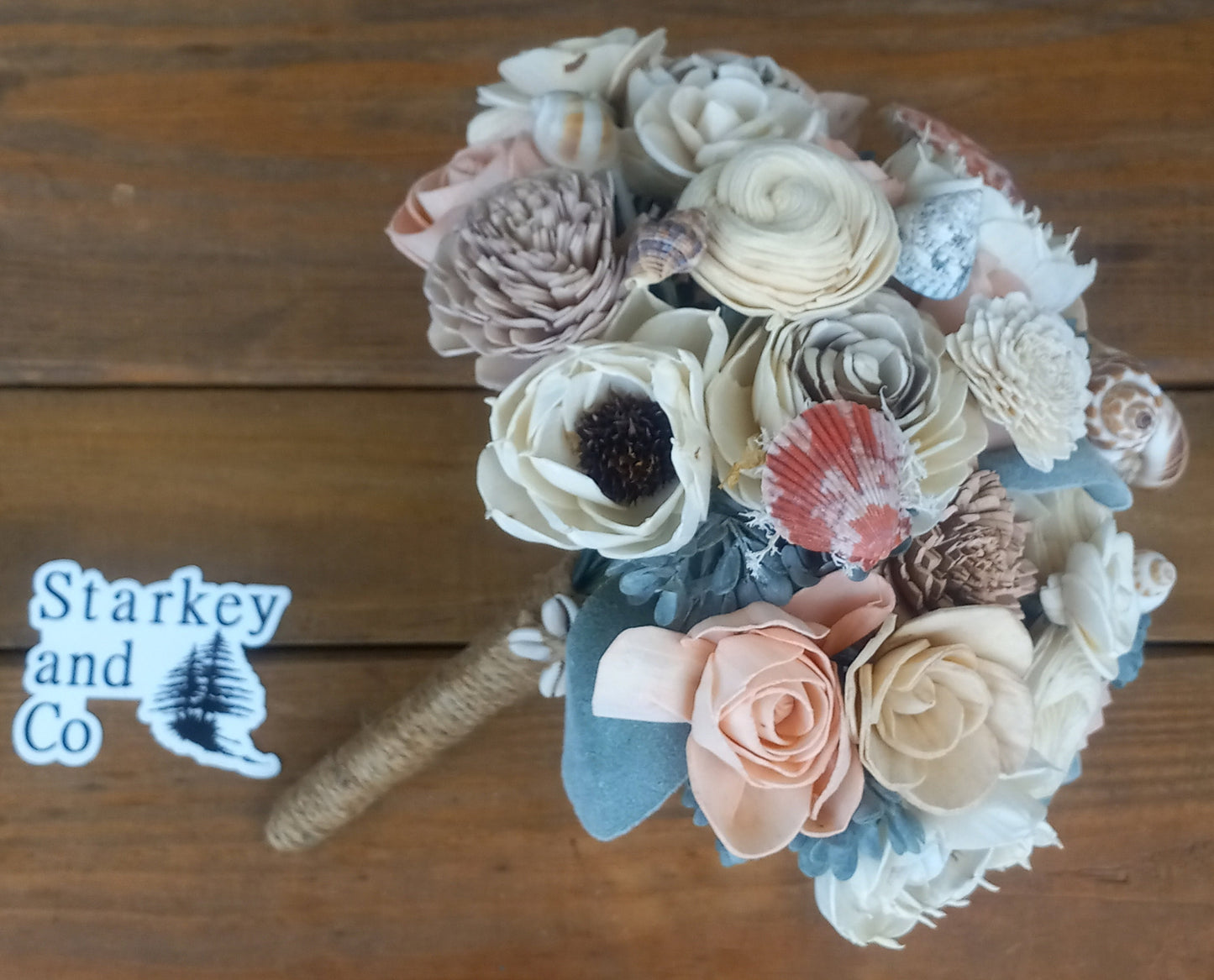 Beach Theme Wedding Bouquet with a matching Boutonniere in Shades of Pinks and Peaches