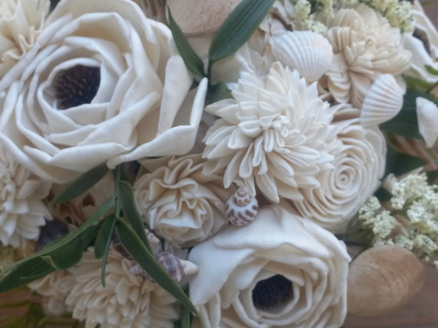 Beach Theme Wedding Bouquet with a matching Boutonniere