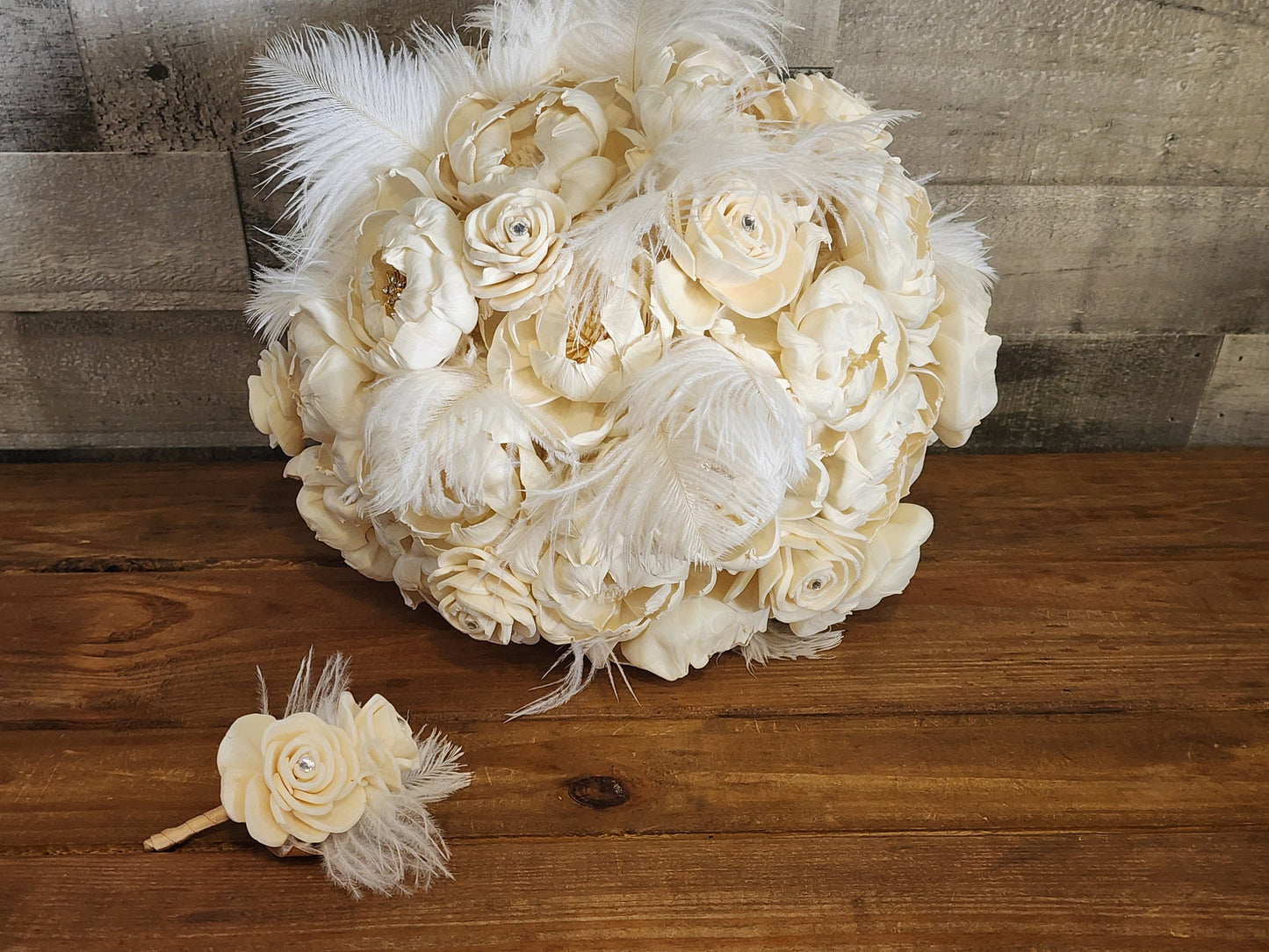 Ivory Sola Wood Flower Wedding Bouquet: Gold Brooches & Feathers. Sola Wood Flower Brides Bouquet and Grooms Boutonniere